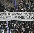 Anderlecht-fans schieten in actie tegen Vandenhaute - Renard