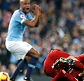 Kompany boort Salah letterlijk en figuurlijk de grond in: 